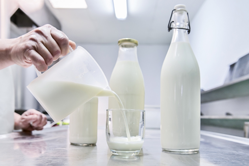 pouring-milk-from-jug-into-glass-background-full-glass-bottles.jpg pouring-milk-from-jug-into-glass-background-full-glass-bottles.jpg